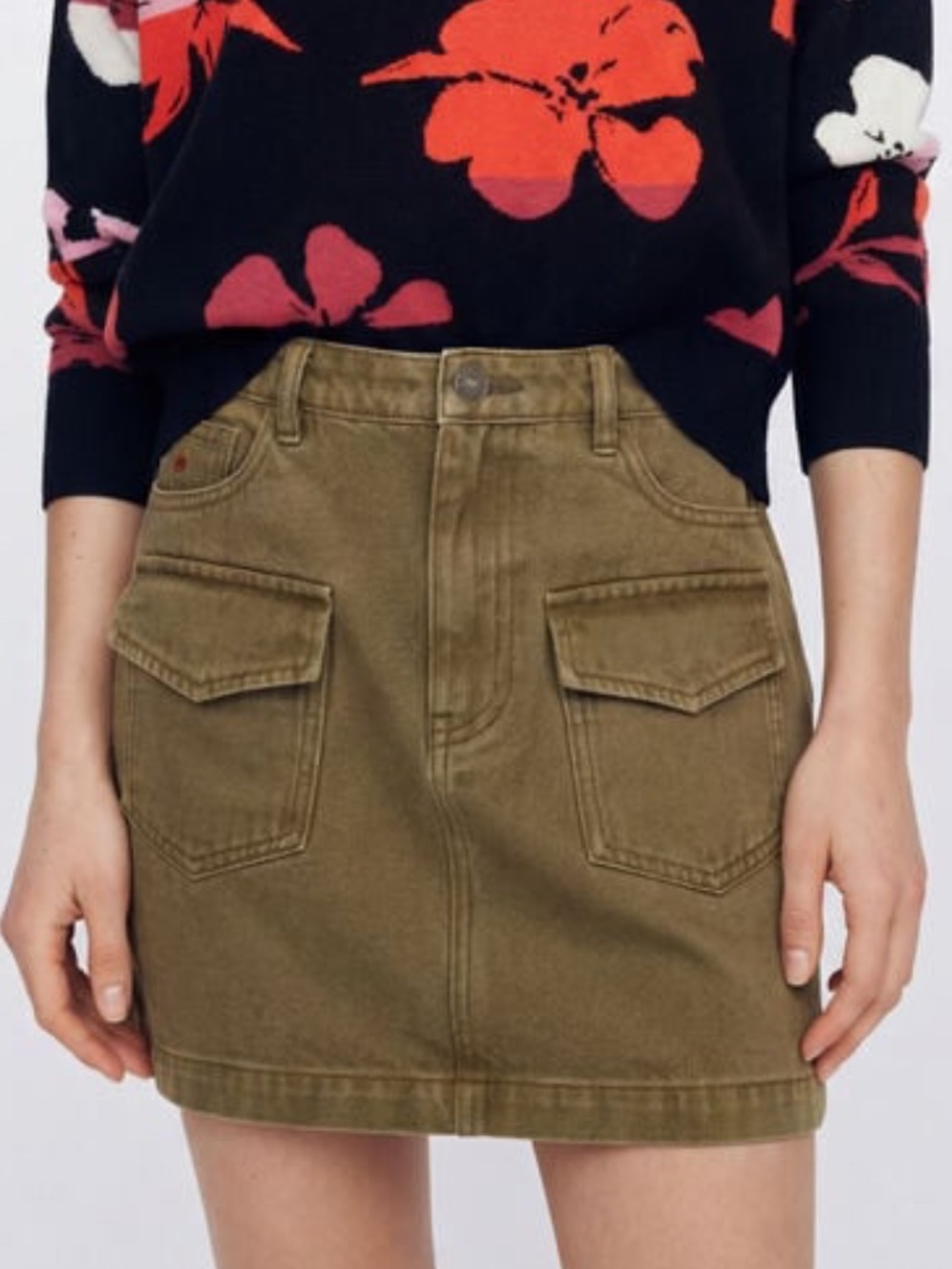 Desigual denim mini skirt with a washed effect and front flap pockets